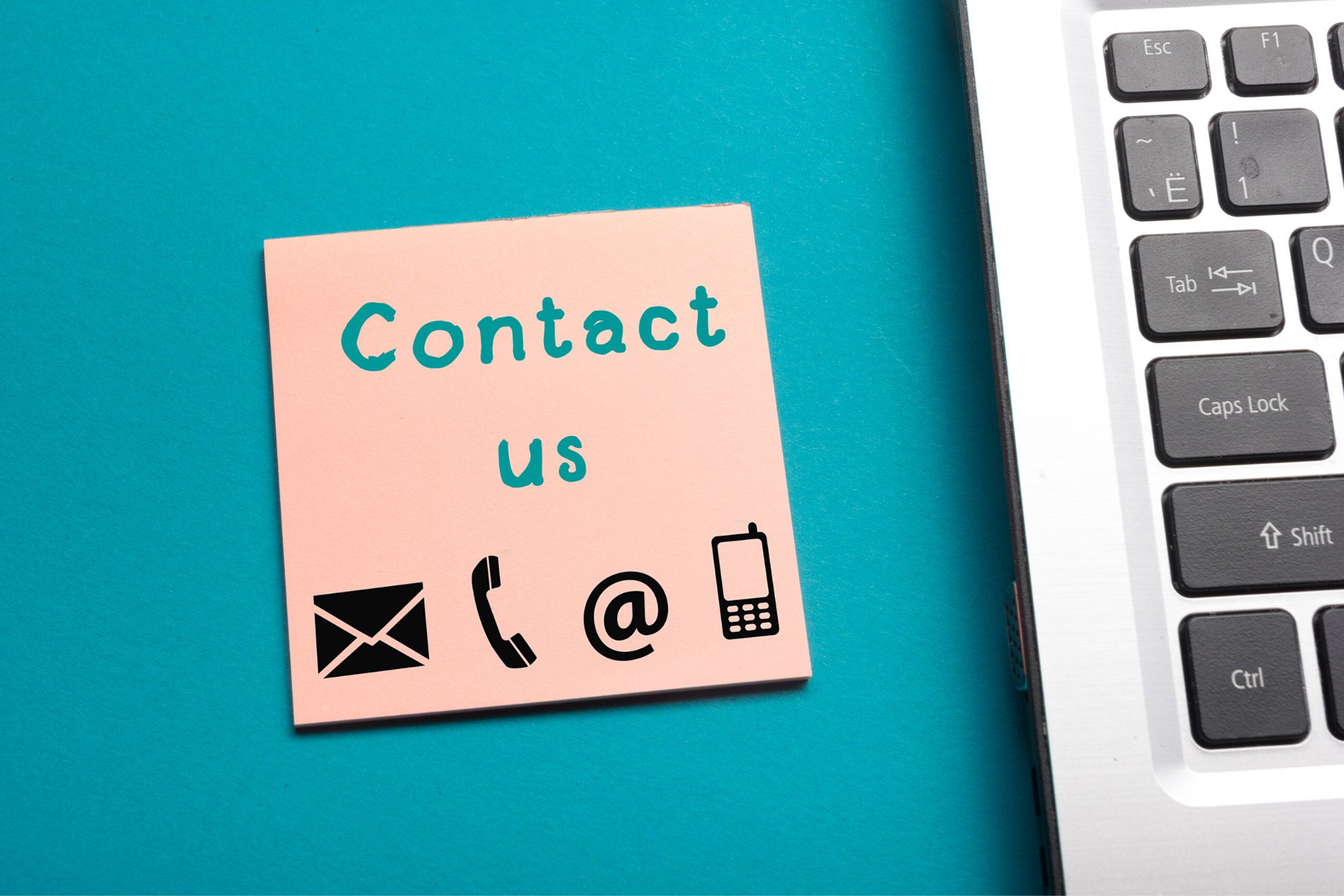 contact us page on post it note